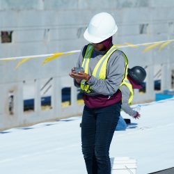 Fix roofing expert inspecting roof